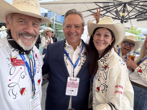 Doug Tisdale with community supporters at an outdoor event